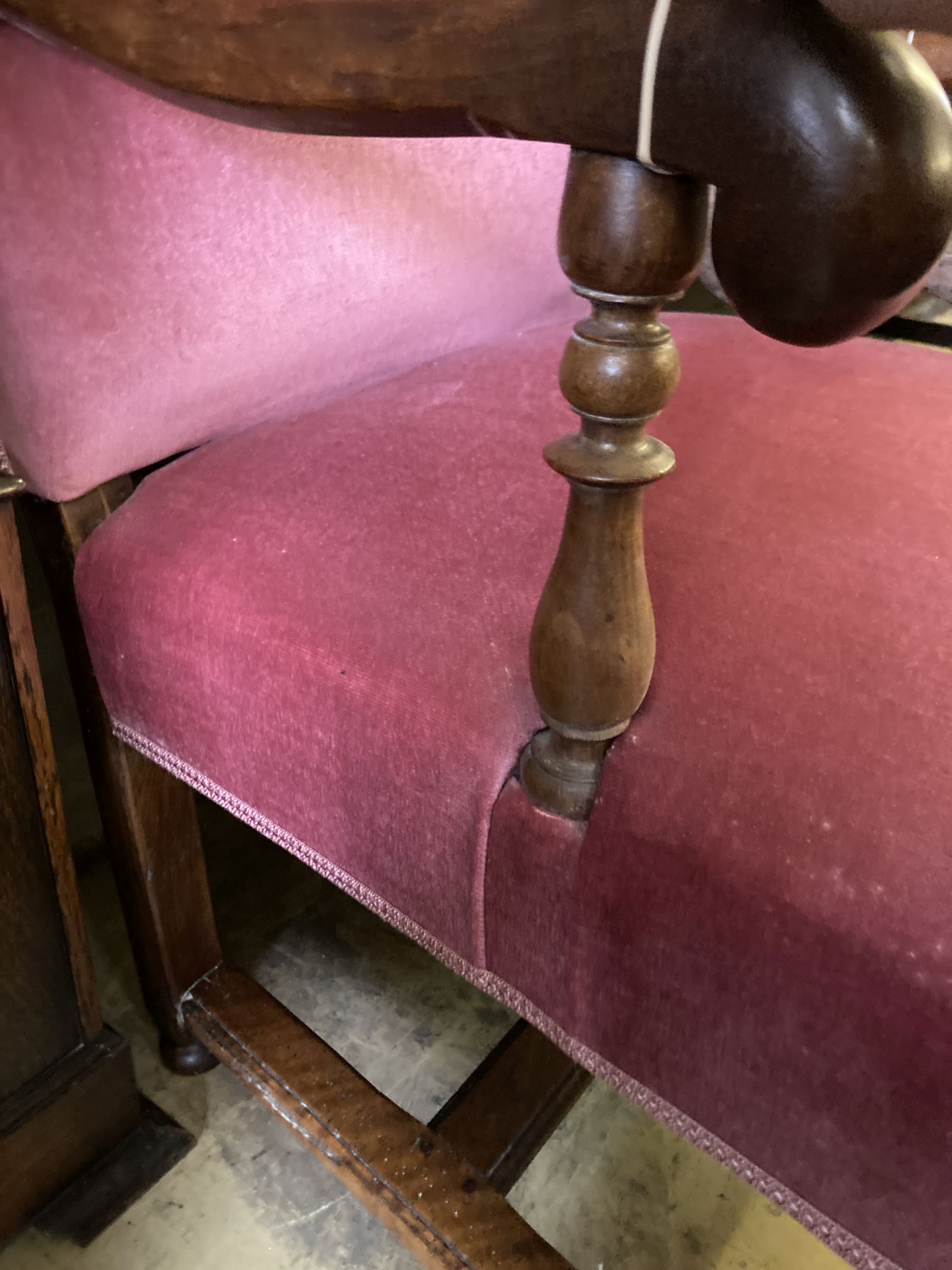 A walnut upholstered elbow chair, circa 1700